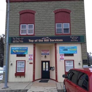 Top of the Hill Services building photo